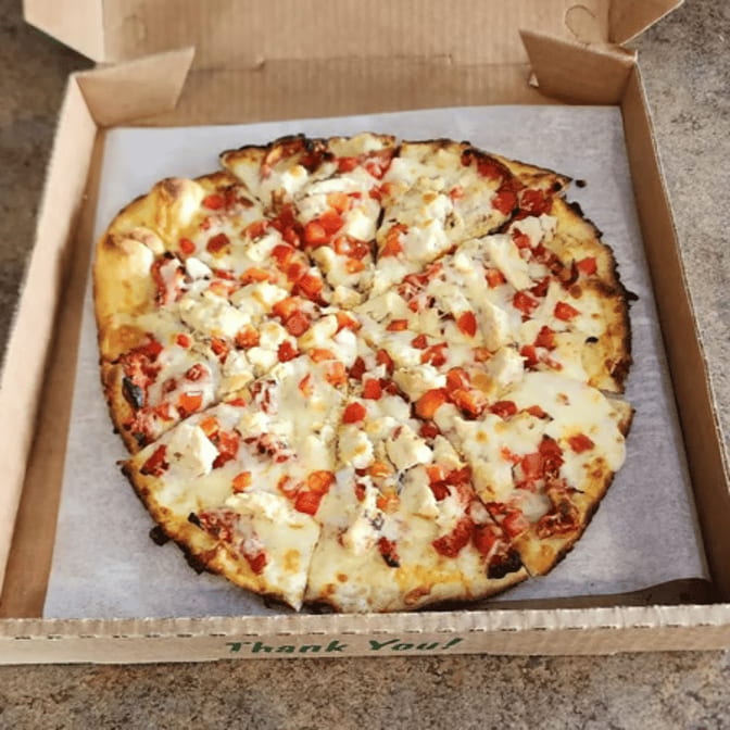 O Large Chicken Sun-Dried Pizza.