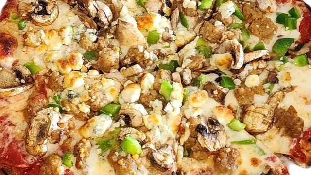O Large Bear Tooth Pizza.
